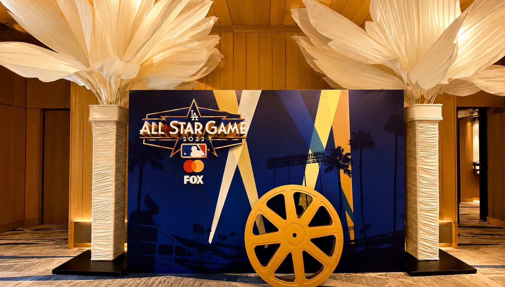 MLB branded lounge in Los Angeles — guests mingling