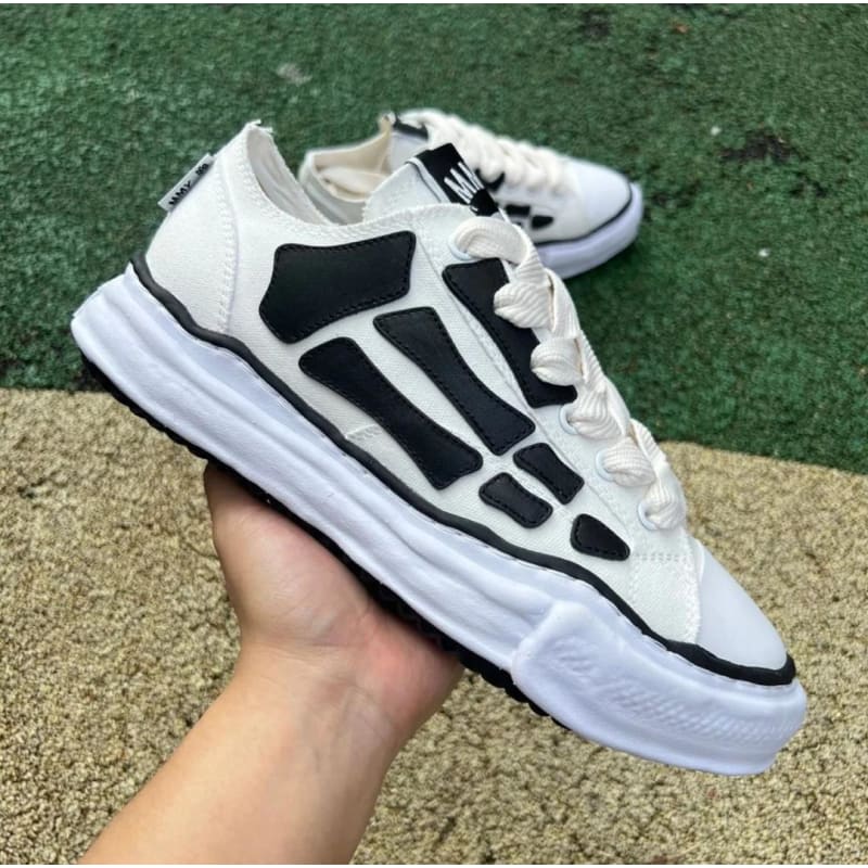 Baskets Amiri Skel-Top Low – Skel-Toe Canvas – Blanc et Noir