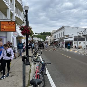 Street scene in town with people and bicycles