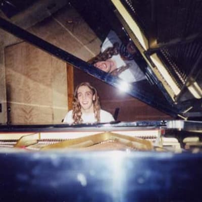 John playing piano