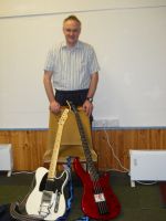 Tom playing bass guitar