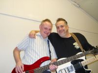 Tom playing bass guitar