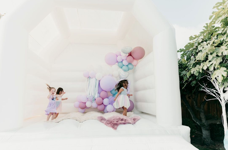 Caught Up In The Moment Photo Booths & Modern Moon Bouncers
