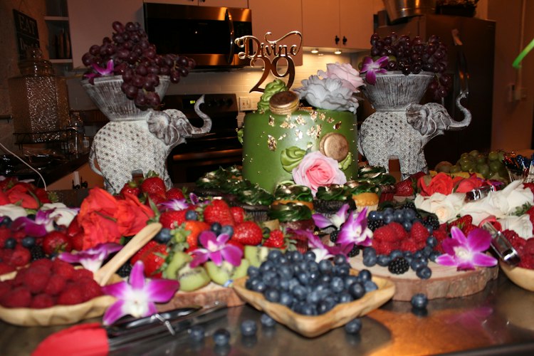 Cake, candy, and fruit table decoration