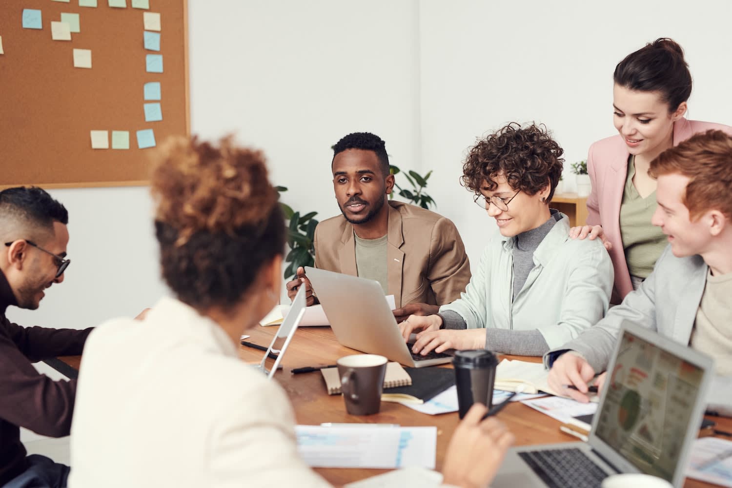 Diverse team working together at community desk