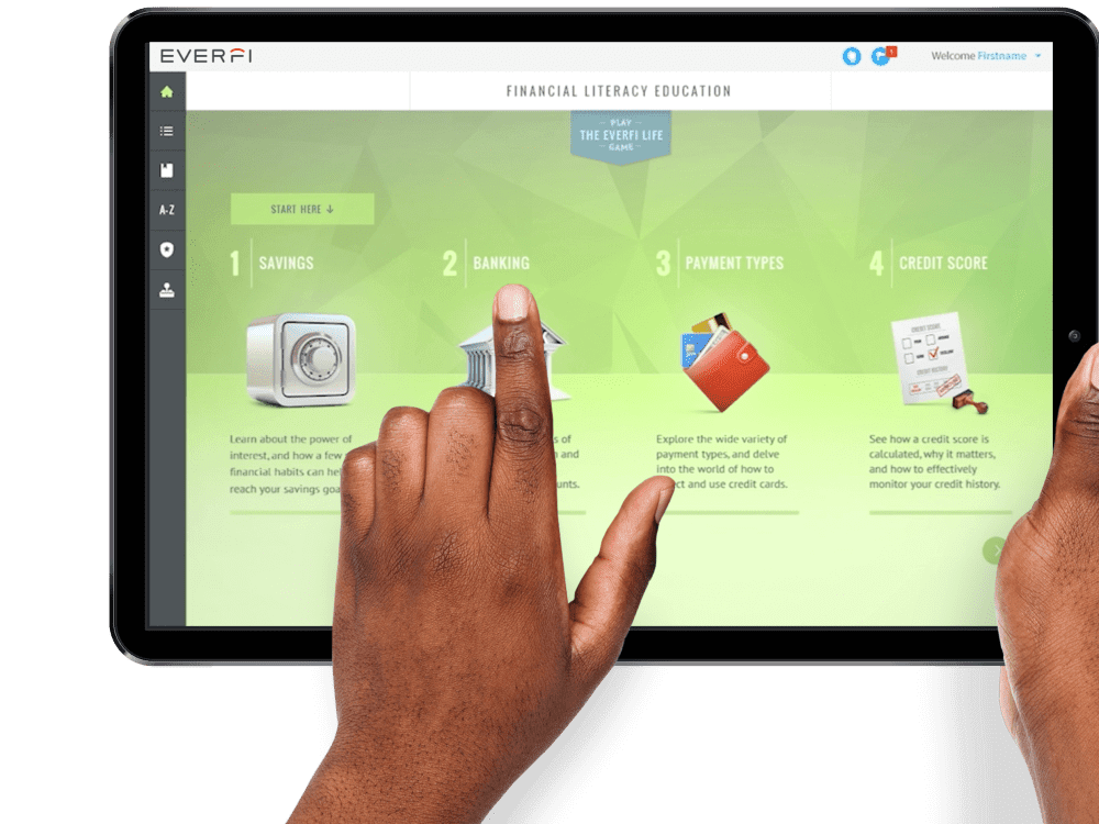 everfi-fined-three Two hands on an iPad on EVERFI's financial literacy education course.