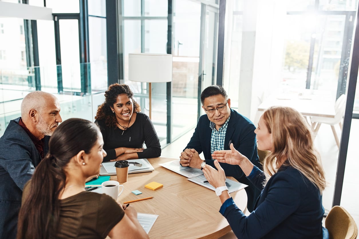 Putting plans into motion Shot of a group of businesspeople having a meeting in an office