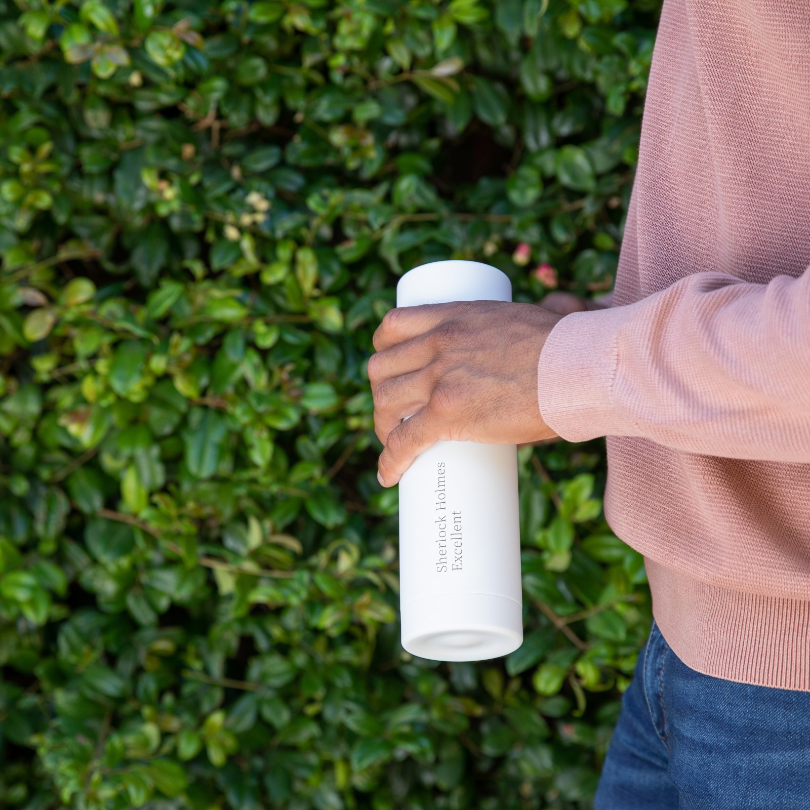 Male holding an Ever Vessel Multi White Sand bottle engraved with his name on the side name shared with a famous detective Sherlock Holmes Excellent