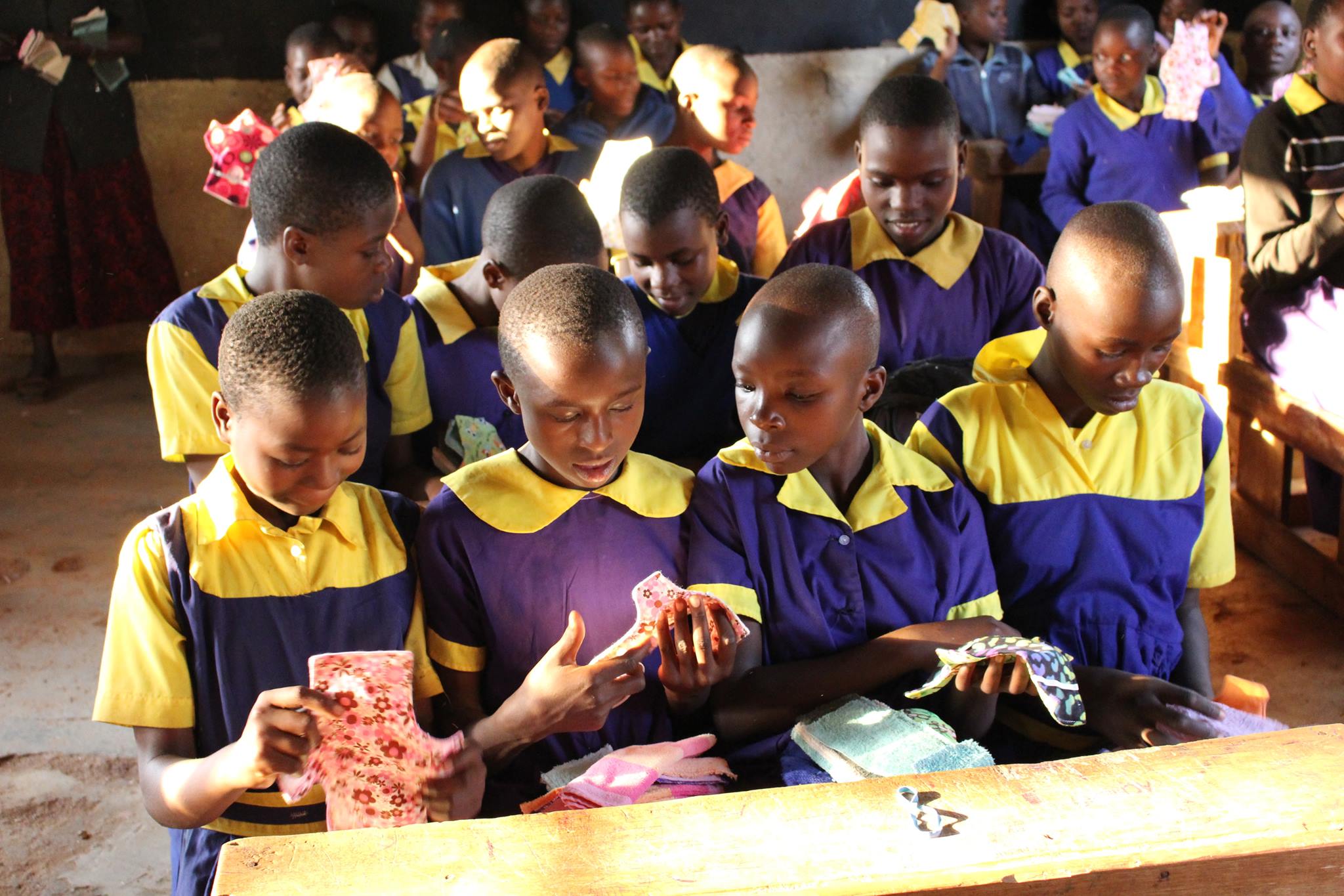 Reusable sanitary pads being given to school girls in Kenya
