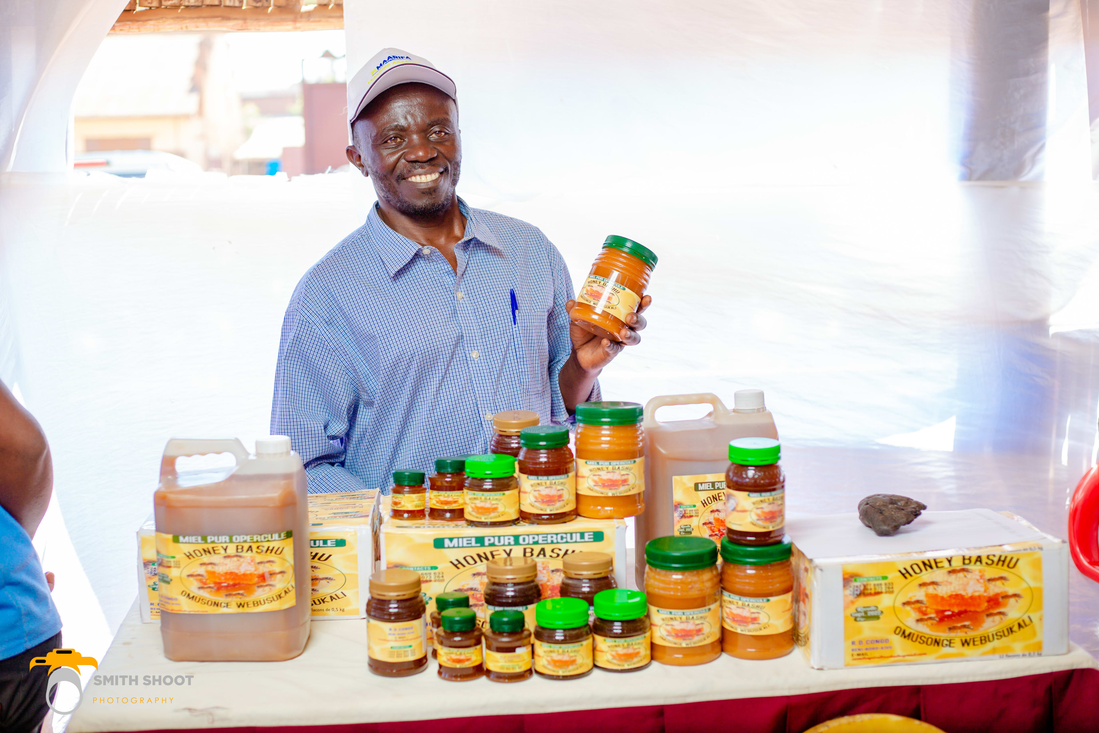 Amos, a beekeeper at Maarifa locally made products business Fair.