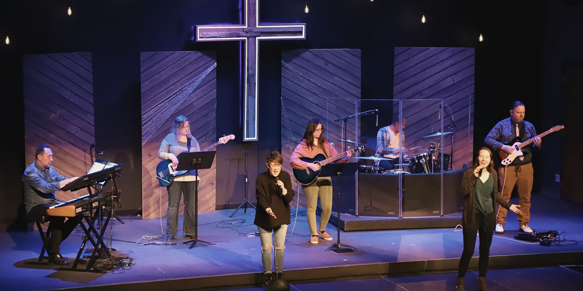 A photo of the worship team playing at a Sunday morning service