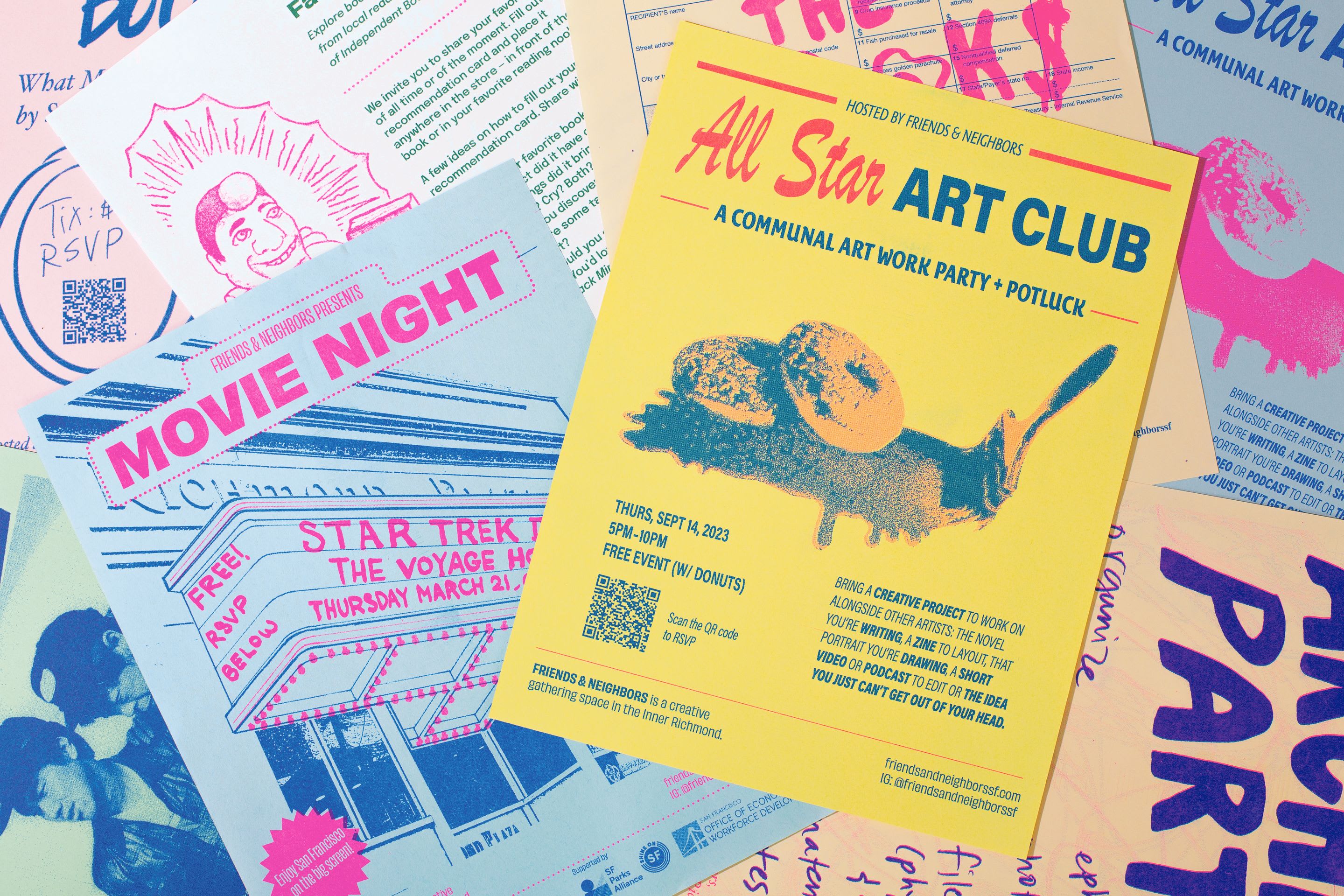 Group of people gathered together at the friends and neighbors studio working on different art projects together