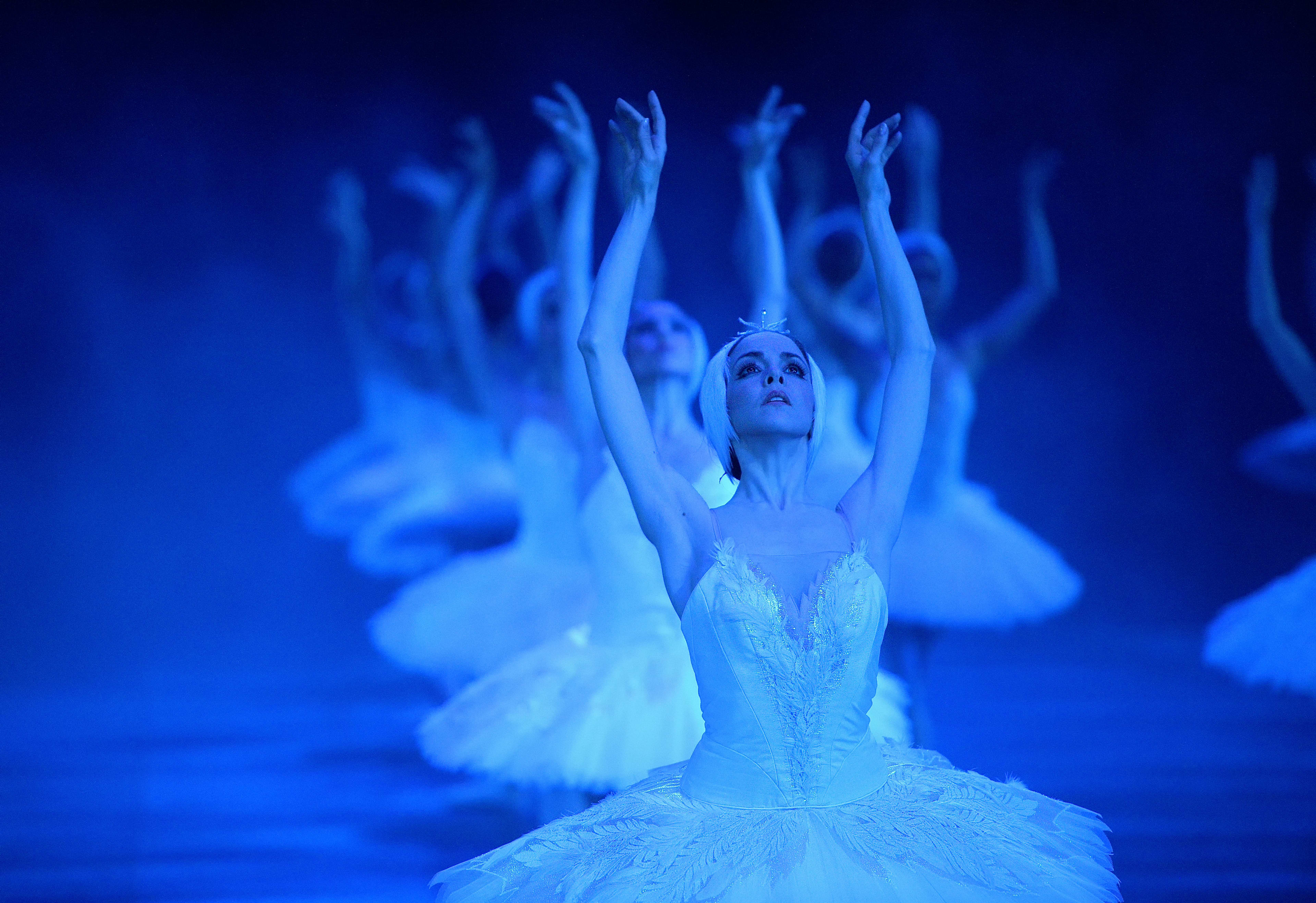 Production images of Derek Deane's Swan Lake in-the-round