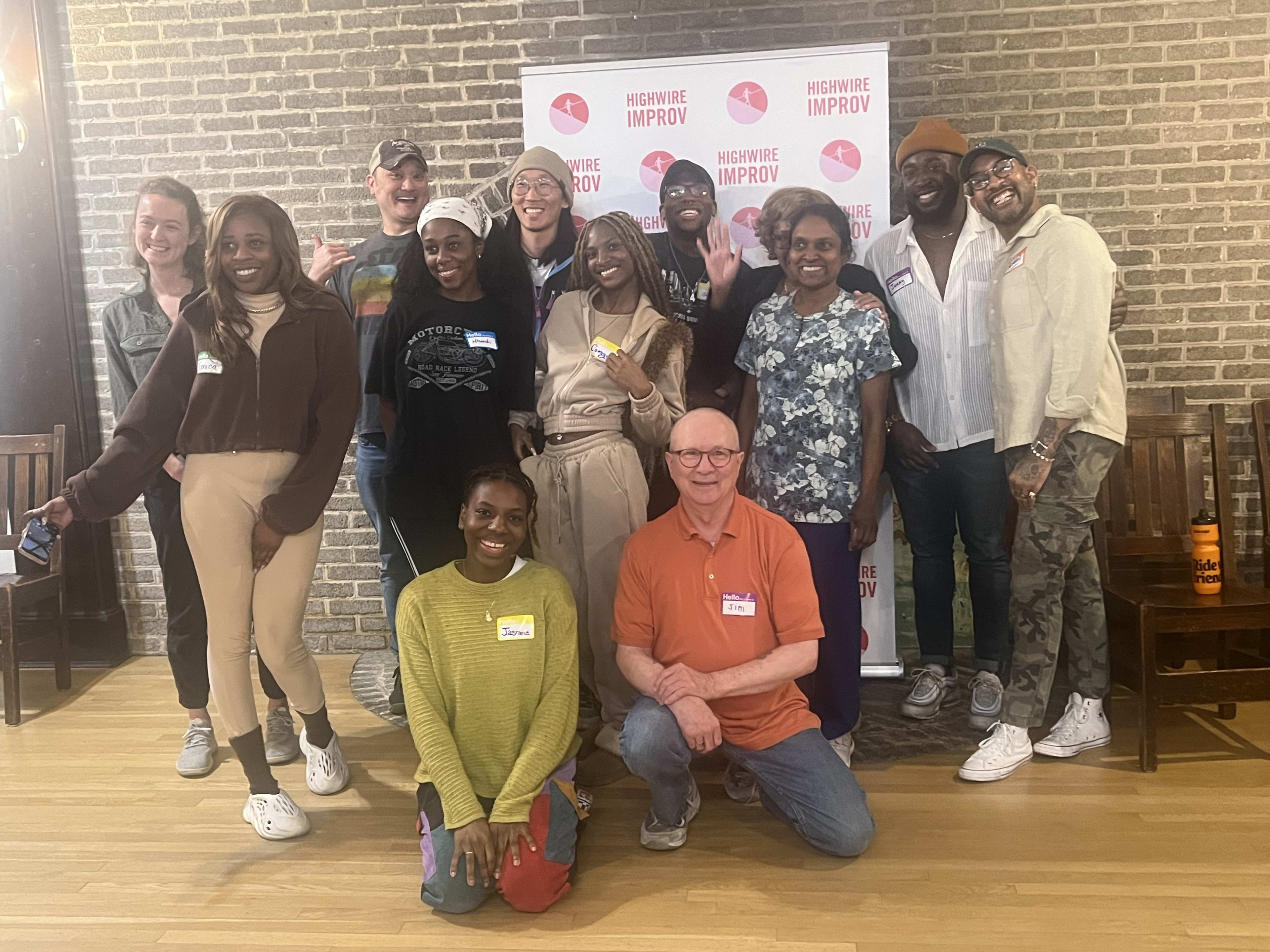 A group of smiling improv workshop participants!