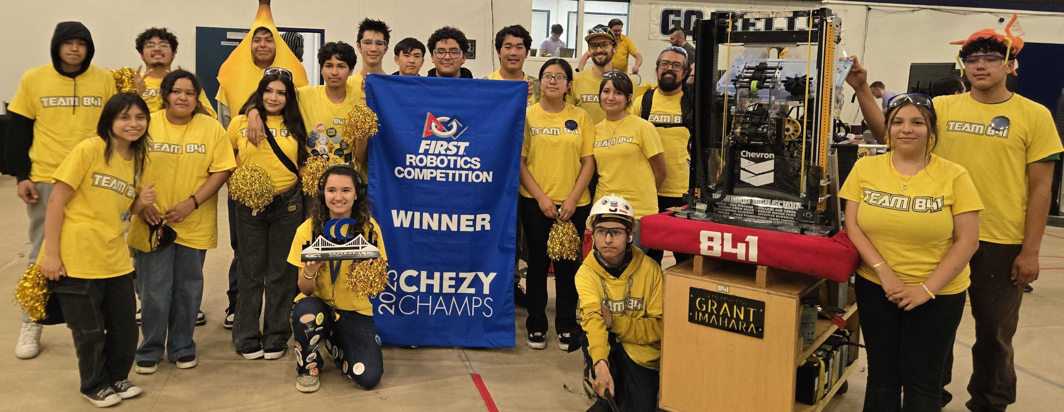 Students and mentors pose after winning the 2025 Chezy Champs offseason tournament