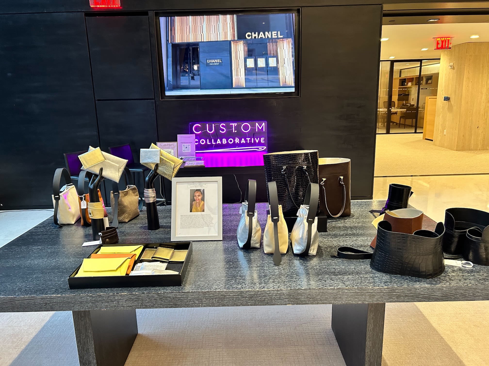 Display of pop-up shop selling leather belts and bags