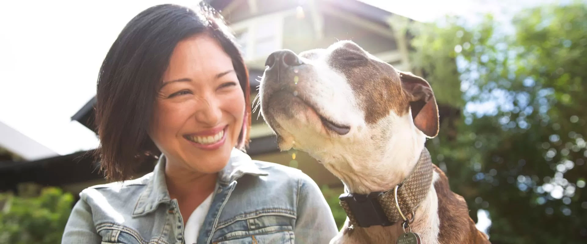 Woman smiling at dog