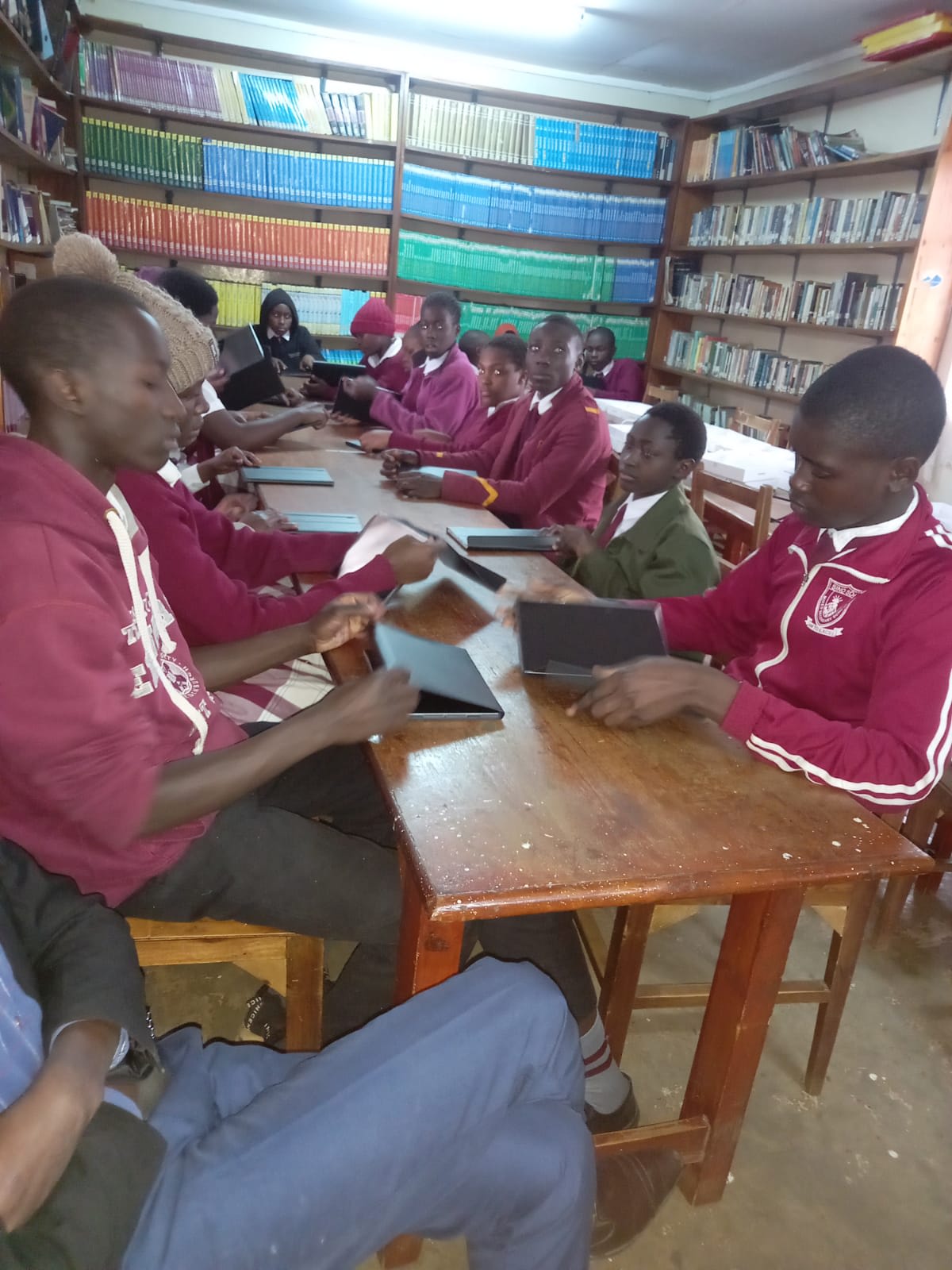 Trinity Secondary School students using tablets in GAA's Digital Learning Program in Kibera Slum, Nairobi, Kenya