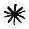 Black hand-drawn asterisk symbol on an off-white background