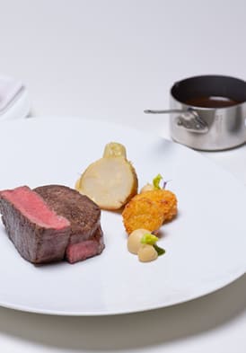 Plat de boeuf d'abondance et ses légumes racines à la carte du restaurant les Fresques à l'hôtel royal evian