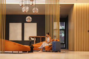 Woman relaxing in an airport lounge