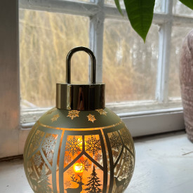 Julekugle gyldent glas med stearinlys effekt.