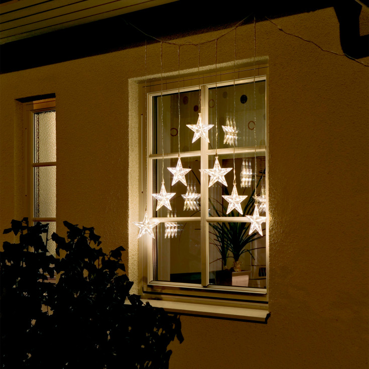 Konstsmide ljusgardin utomhus, 7 varmvita ljus, stjärnor