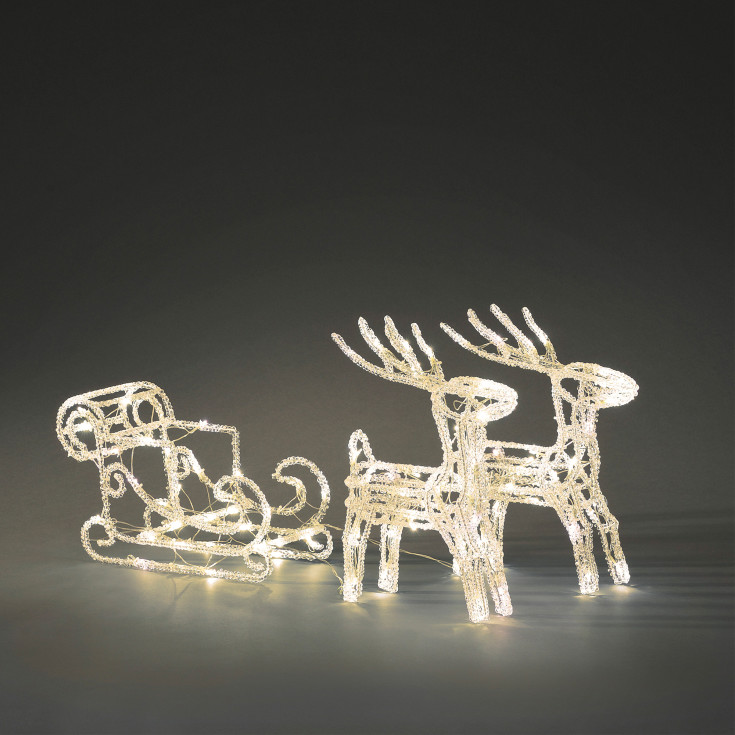 Konstsmide ren med släde