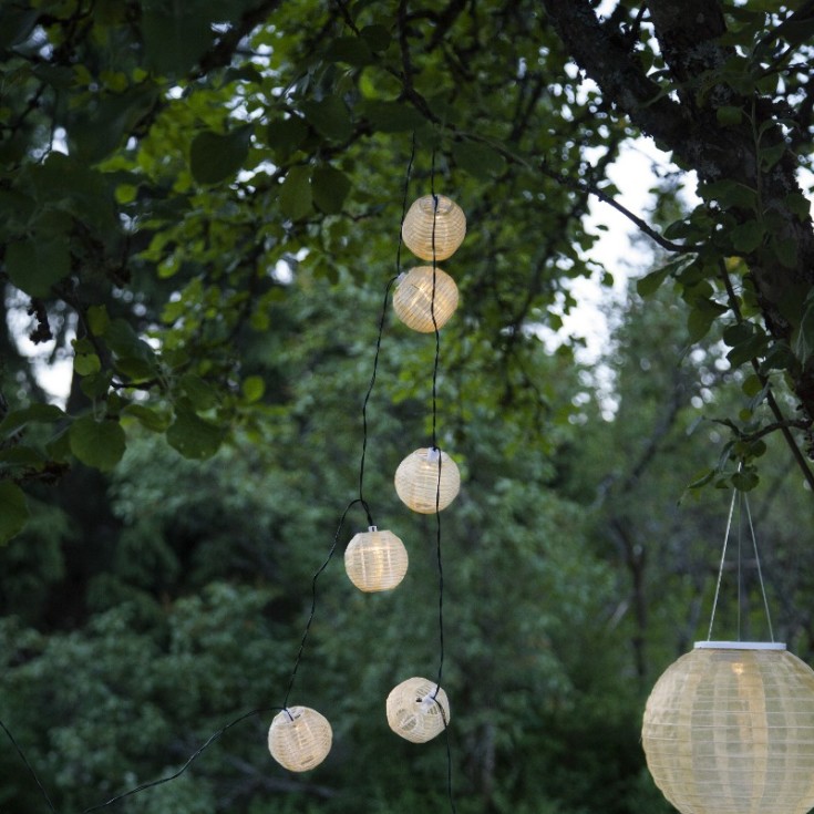 Star Trading Festival sollyskjede med gule kuler