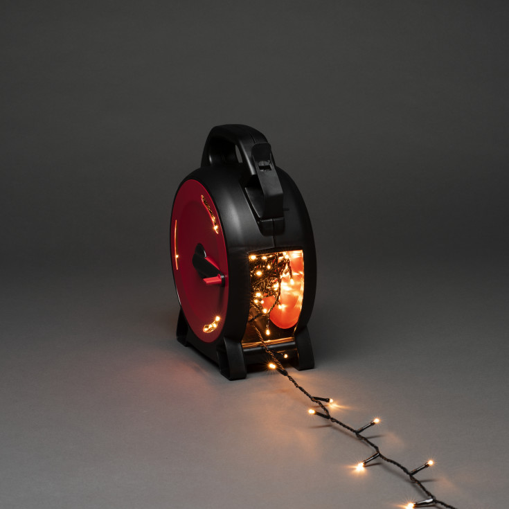 Konstsmide lyslenke utendørs på kabeltrommel, 600 ravfargede lys, 41,93 meter