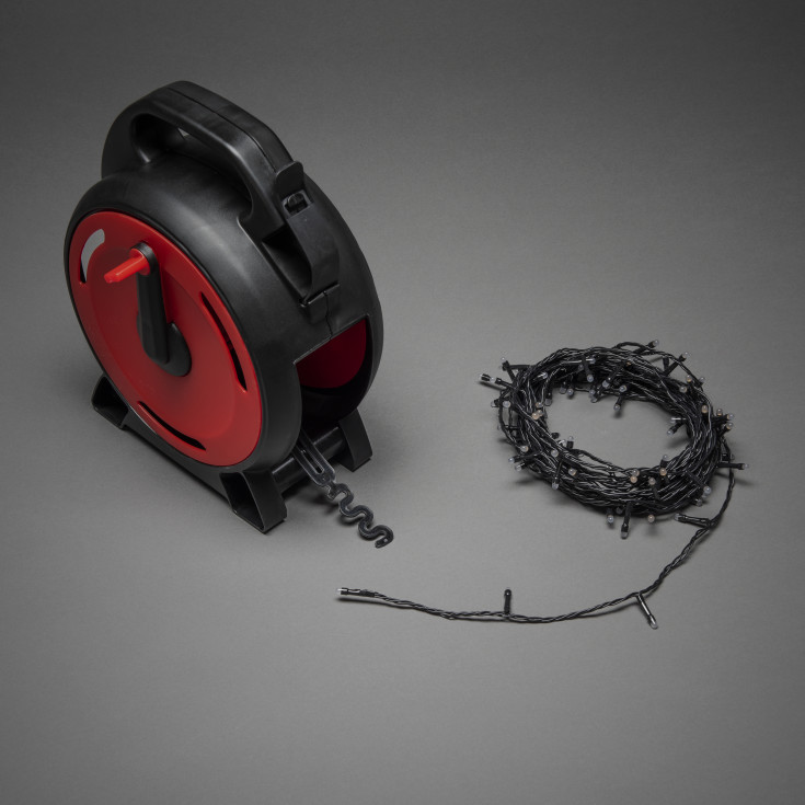 Konstsmide lyslenke utendørs på kabeltrommel, 600 ravfargede lys, 41,93 meter