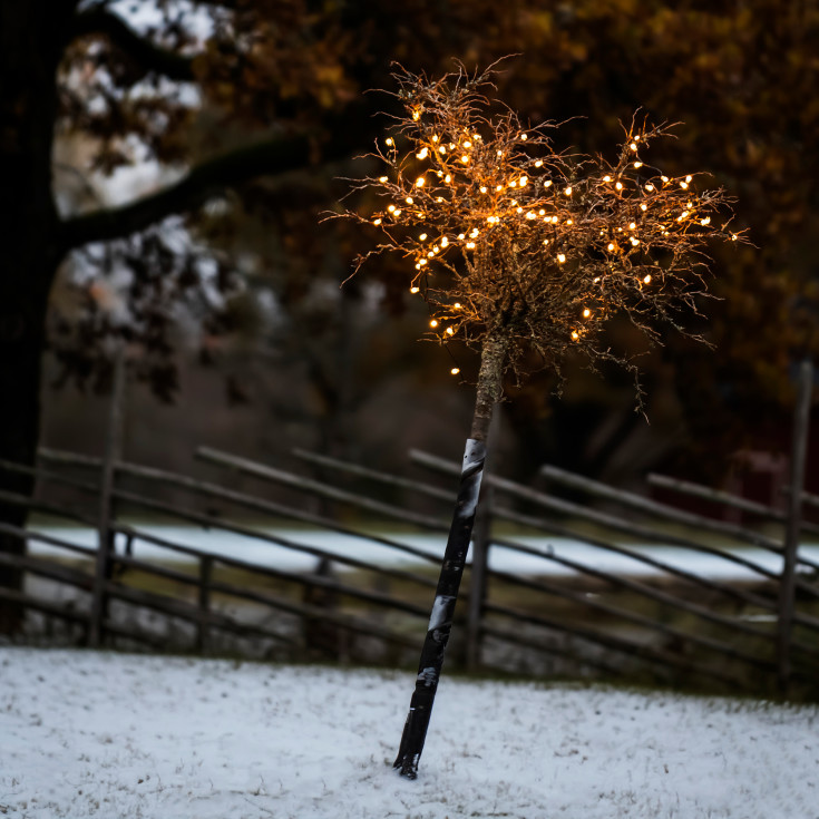 Konstsmide lyslenke utendørs, 100 ravfargede lys, 9,9 meter