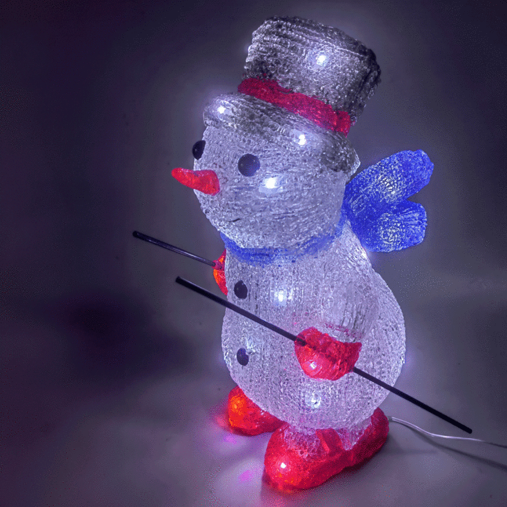 Veli Line Snømann på ski