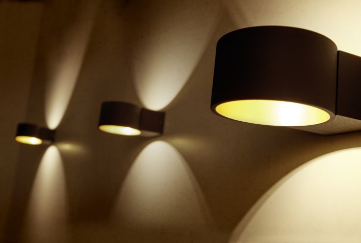 Trio Lighting Lacapo vegglampe, sort/gull
