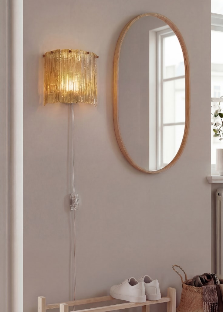 Aneta Lighting Abelone vägglampa, bärnstensfärgad/svart