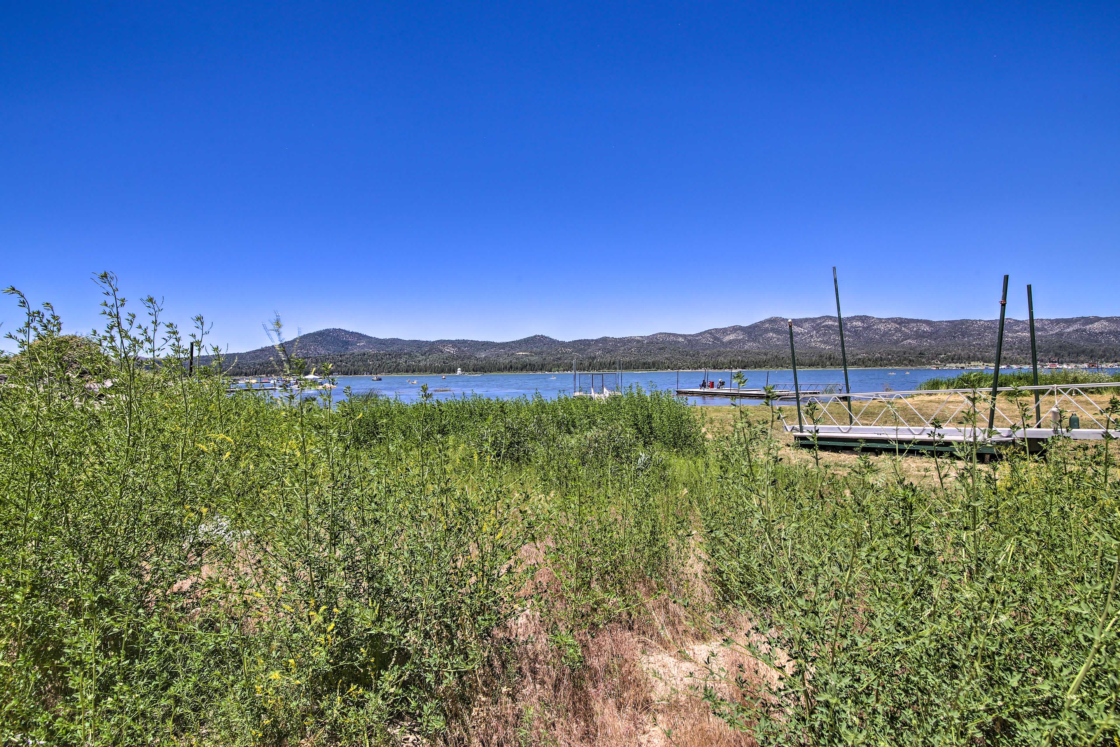 Big Bear Lake, CA view of the lake with tree-covered hills in the background