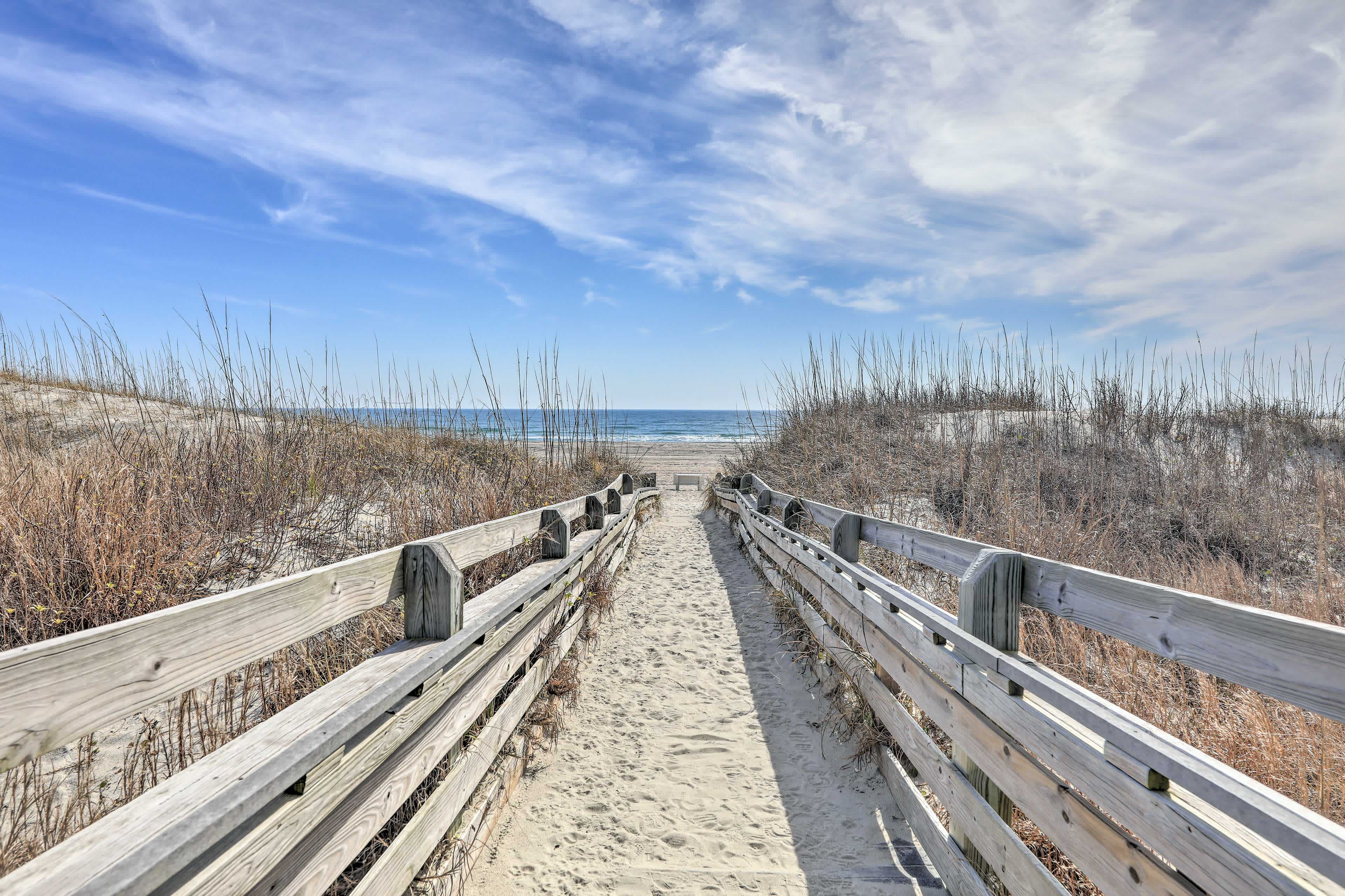 Beach view in Atlantic Beach, NC with a sandy path leading down to the ocean