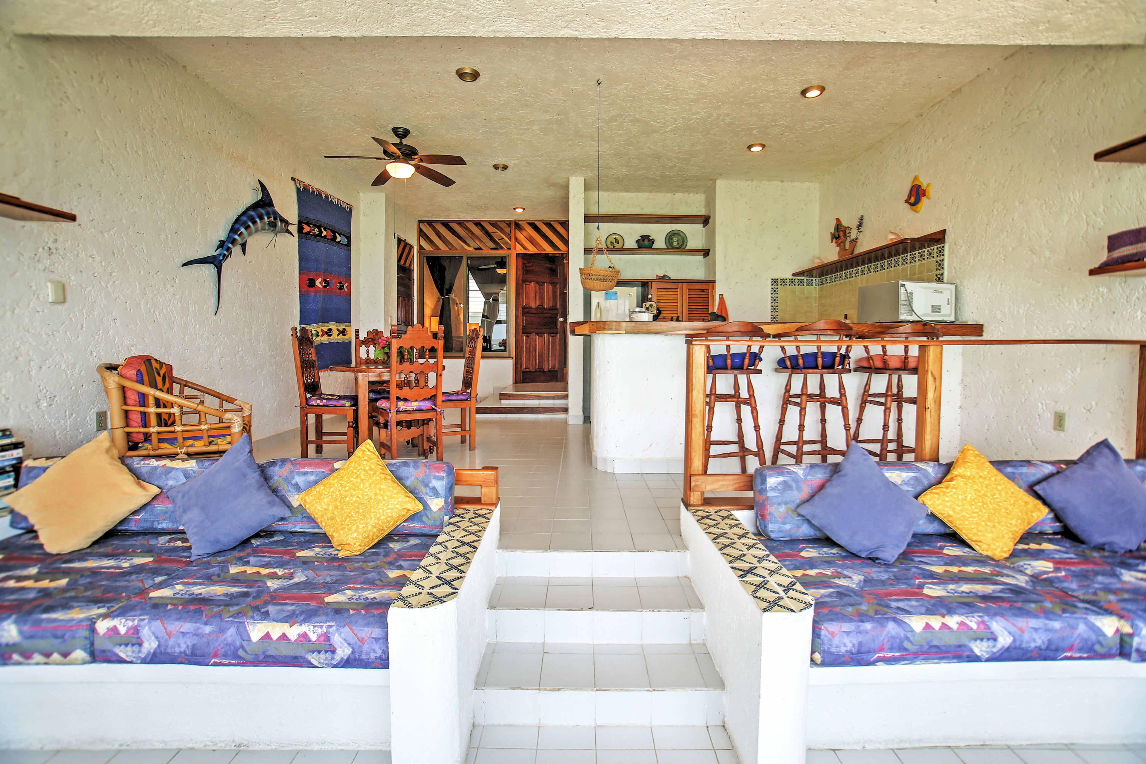 Enjoy the vibrant Yucatan decor in this beautiful Akumal condo.