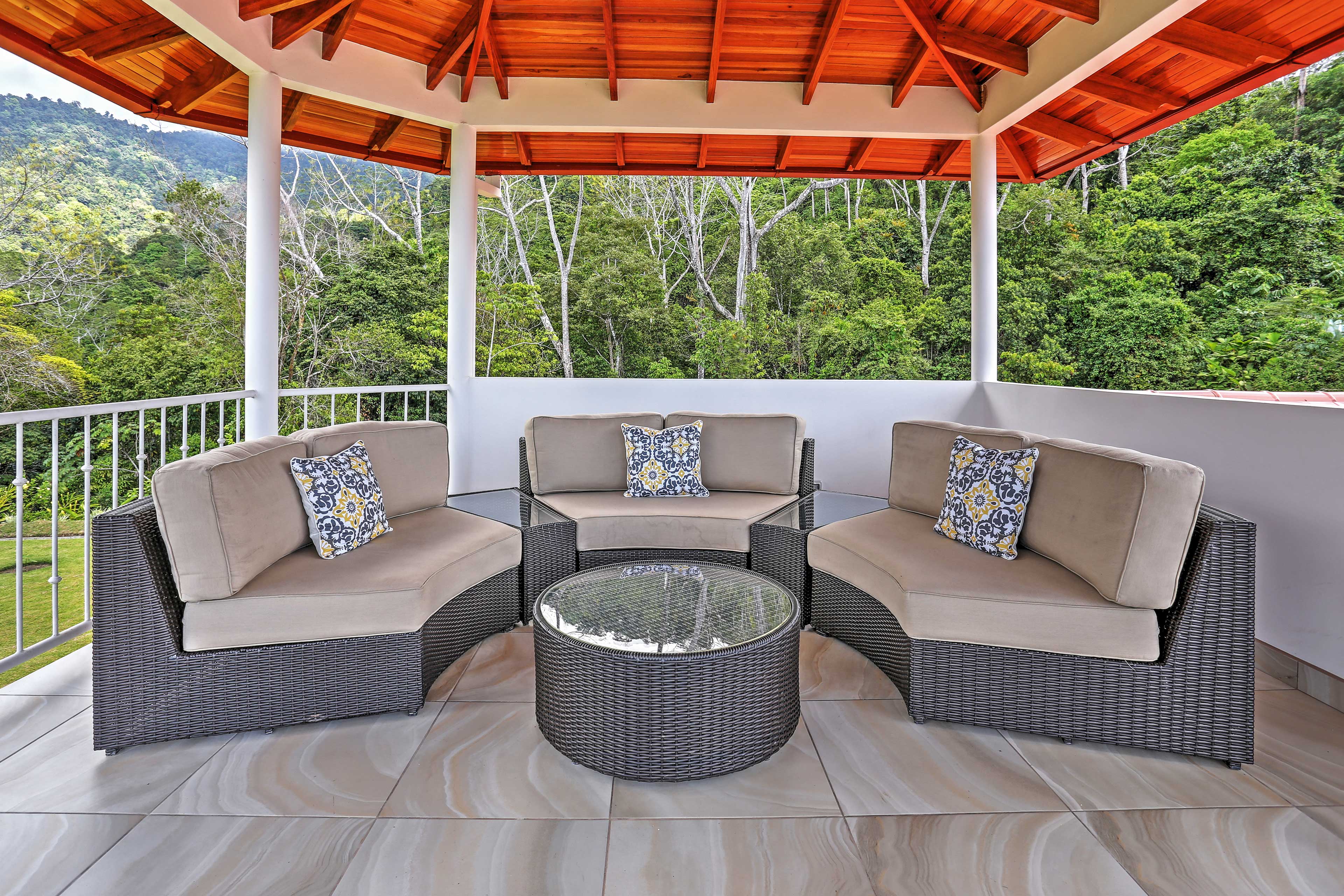 The upper deck provides an additional area to soak in the views, with cozy outdoor sofas.