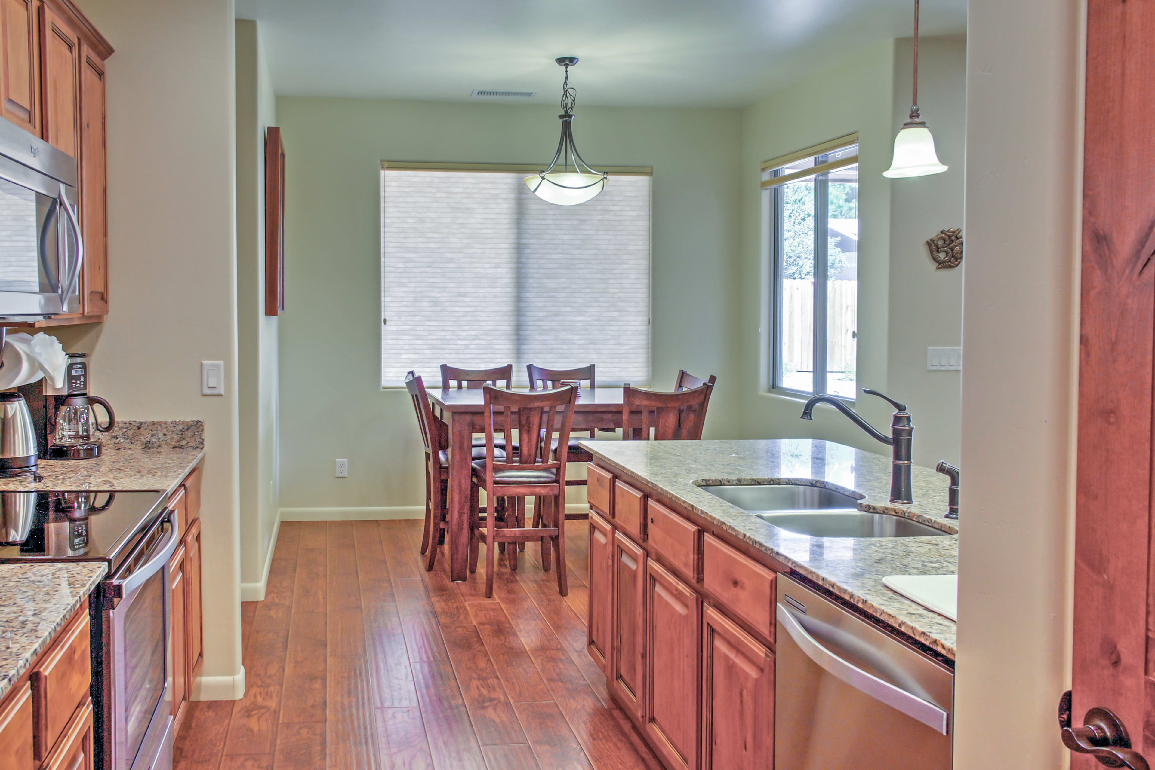 A true chef's delight, this fully equipped kitchen is complete with granite counters and stainless steel appliances.