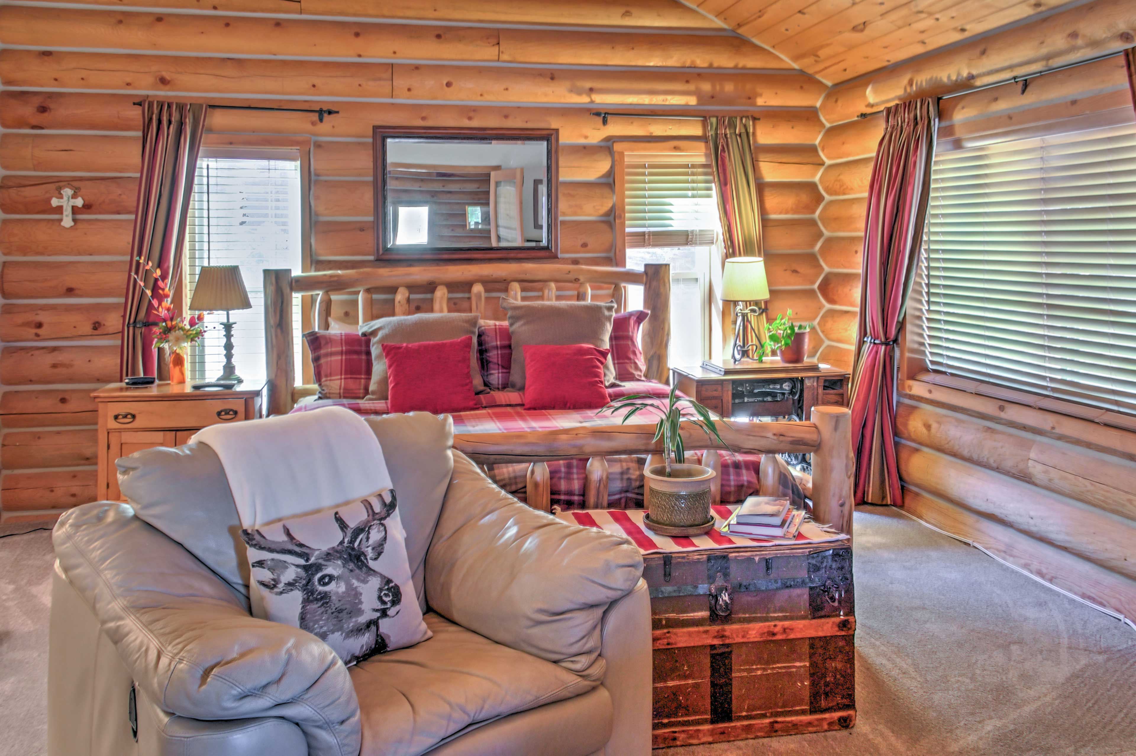 This bedroom offers a king bed.