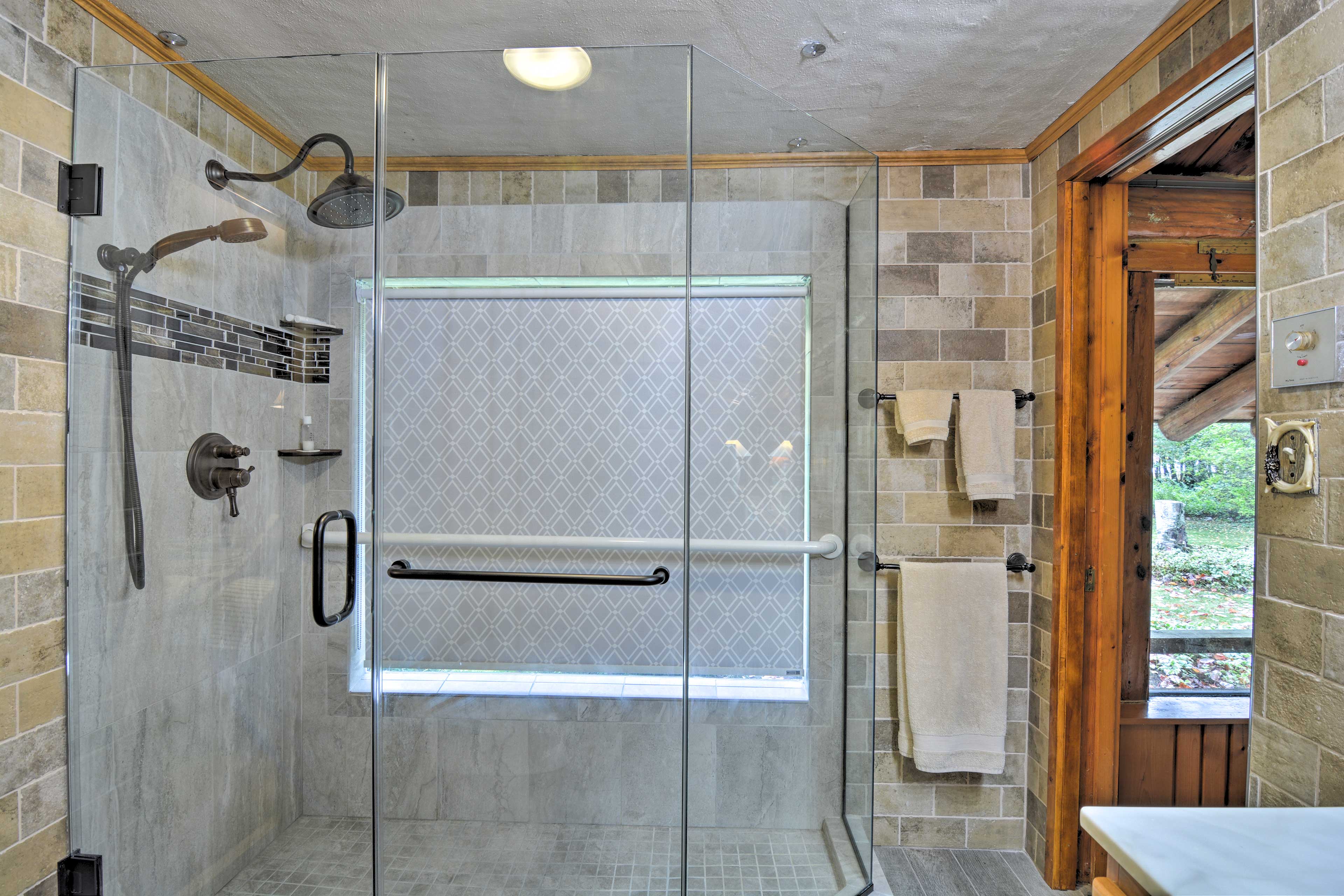 Rinse off the day in this lavish walk-in shower.