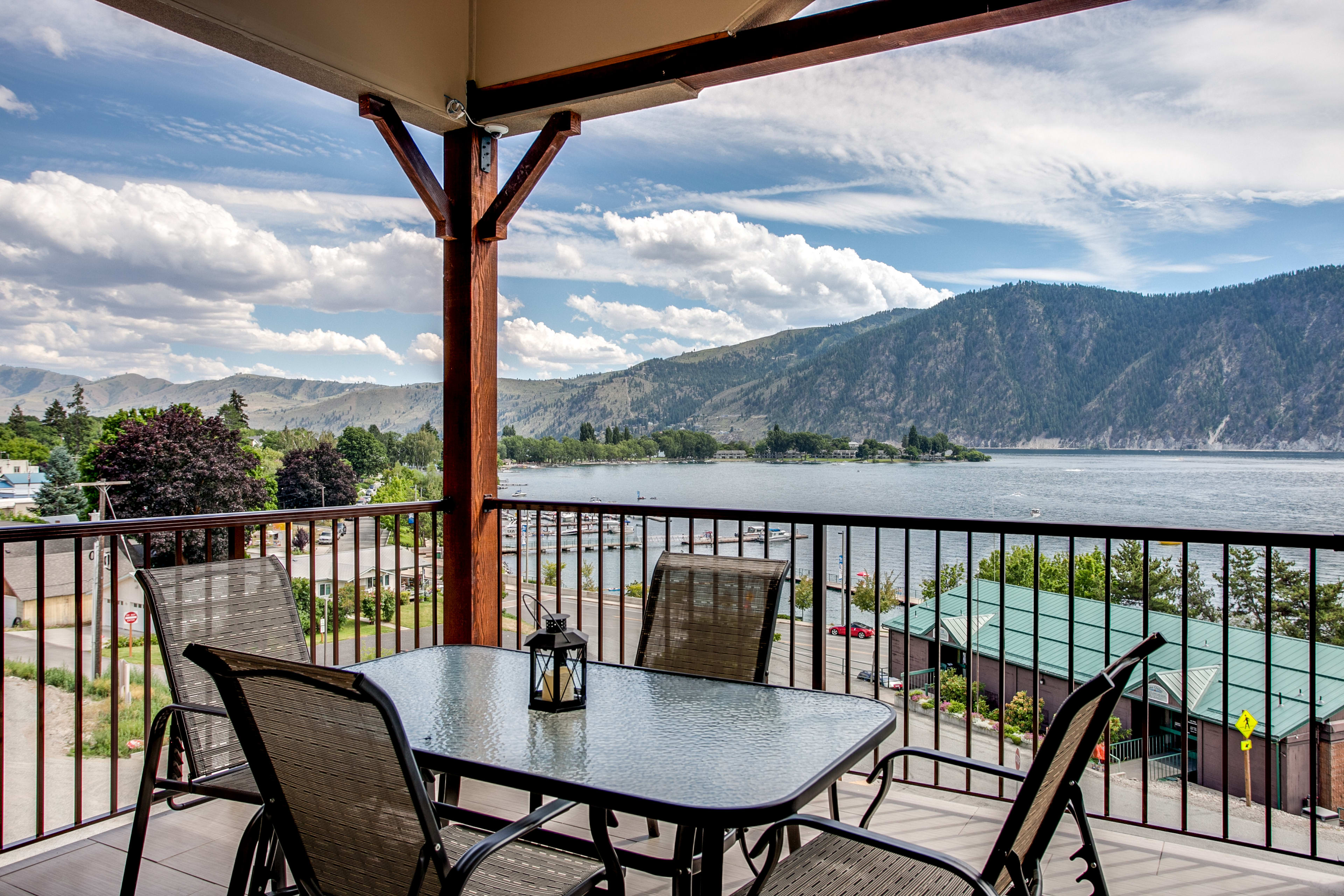 Balcony | Water & Mountain Views | Outdoor Dining