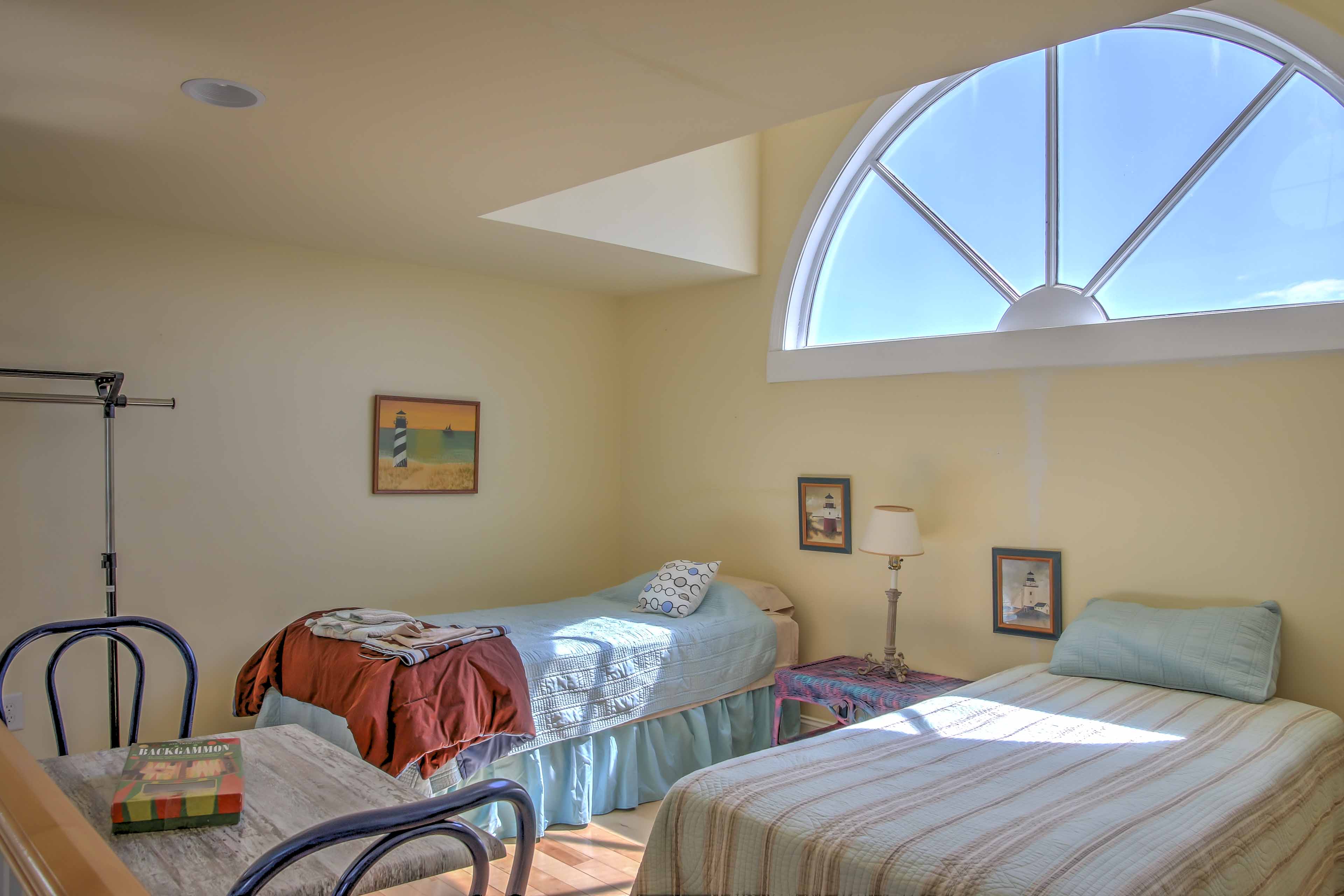 With 2 twin beds, games, DVD player, and table, the loft is made for kids!