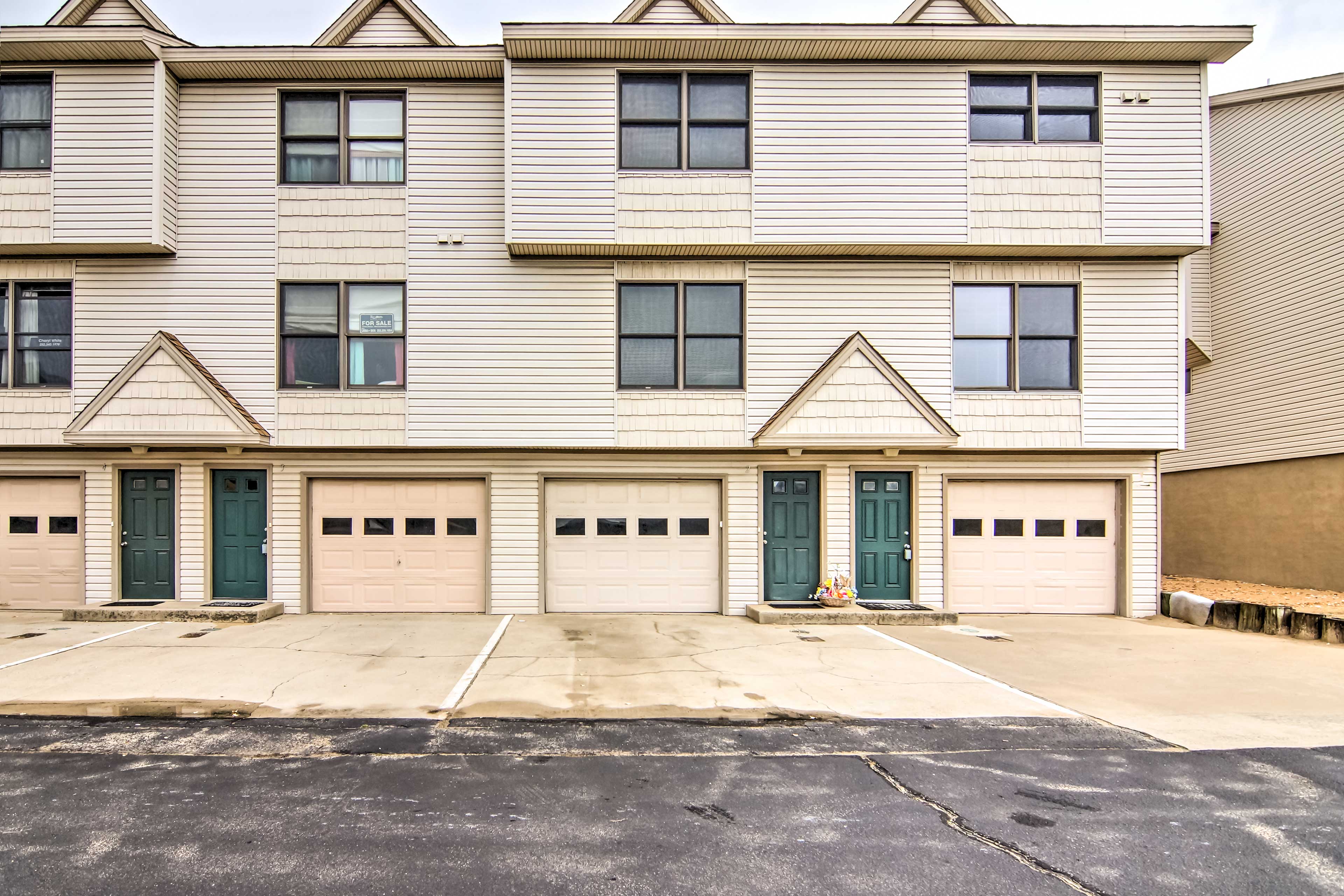 Townhome Exterior | Driveway Parking (1 Vehicle)