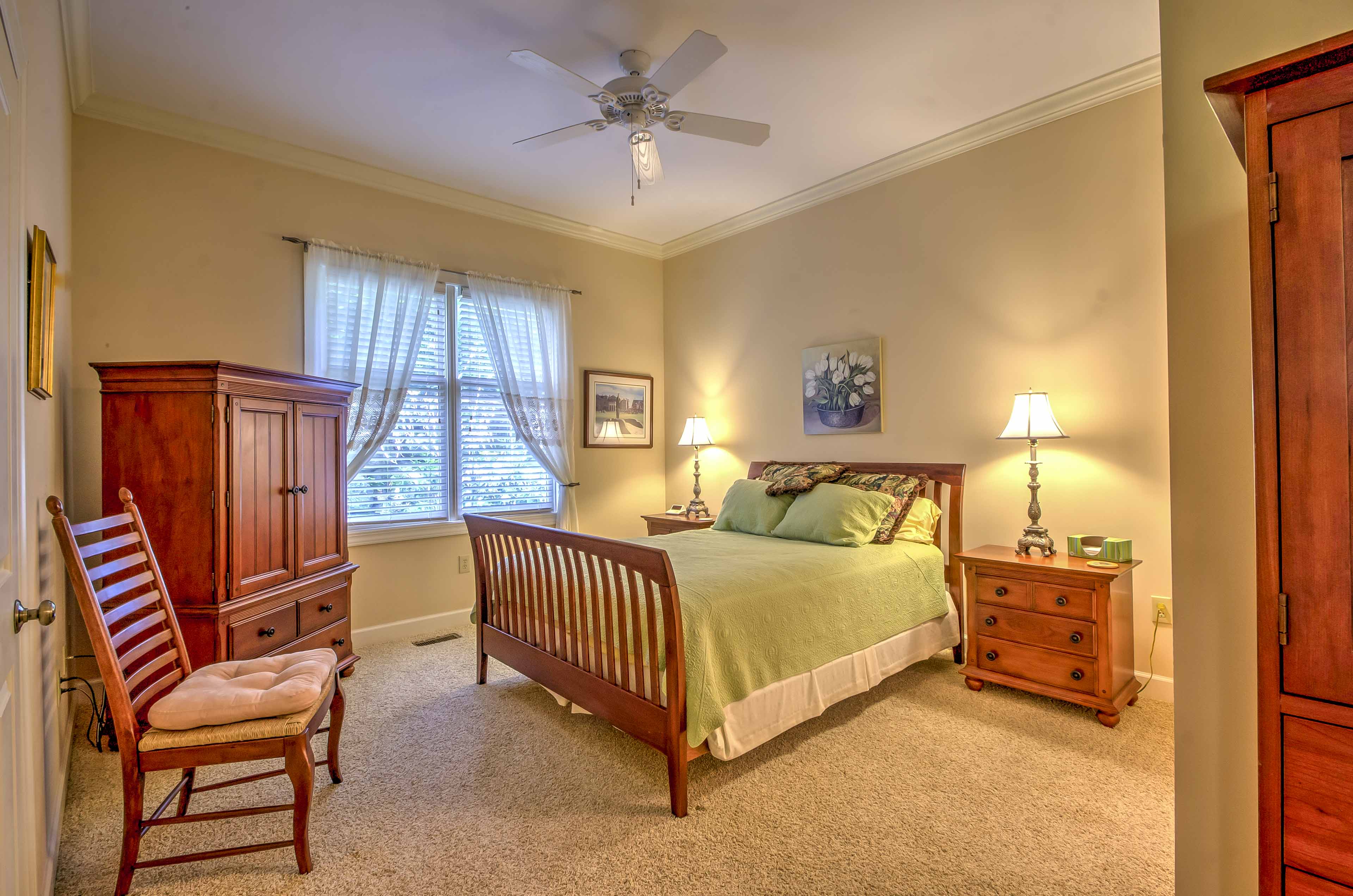 The second bedroom has a queen-sized bed.