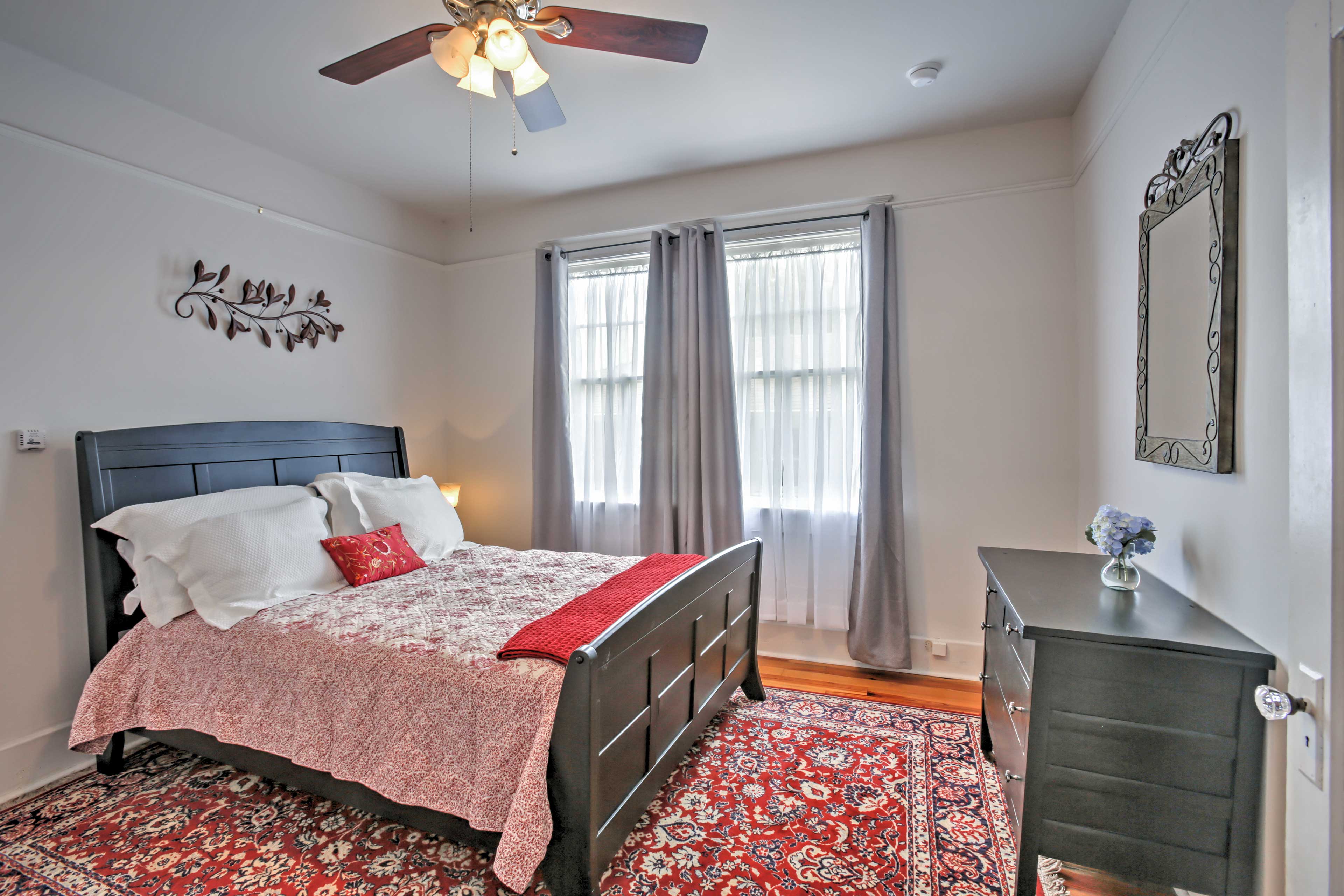 The master bedroom features a queen-sized bed.