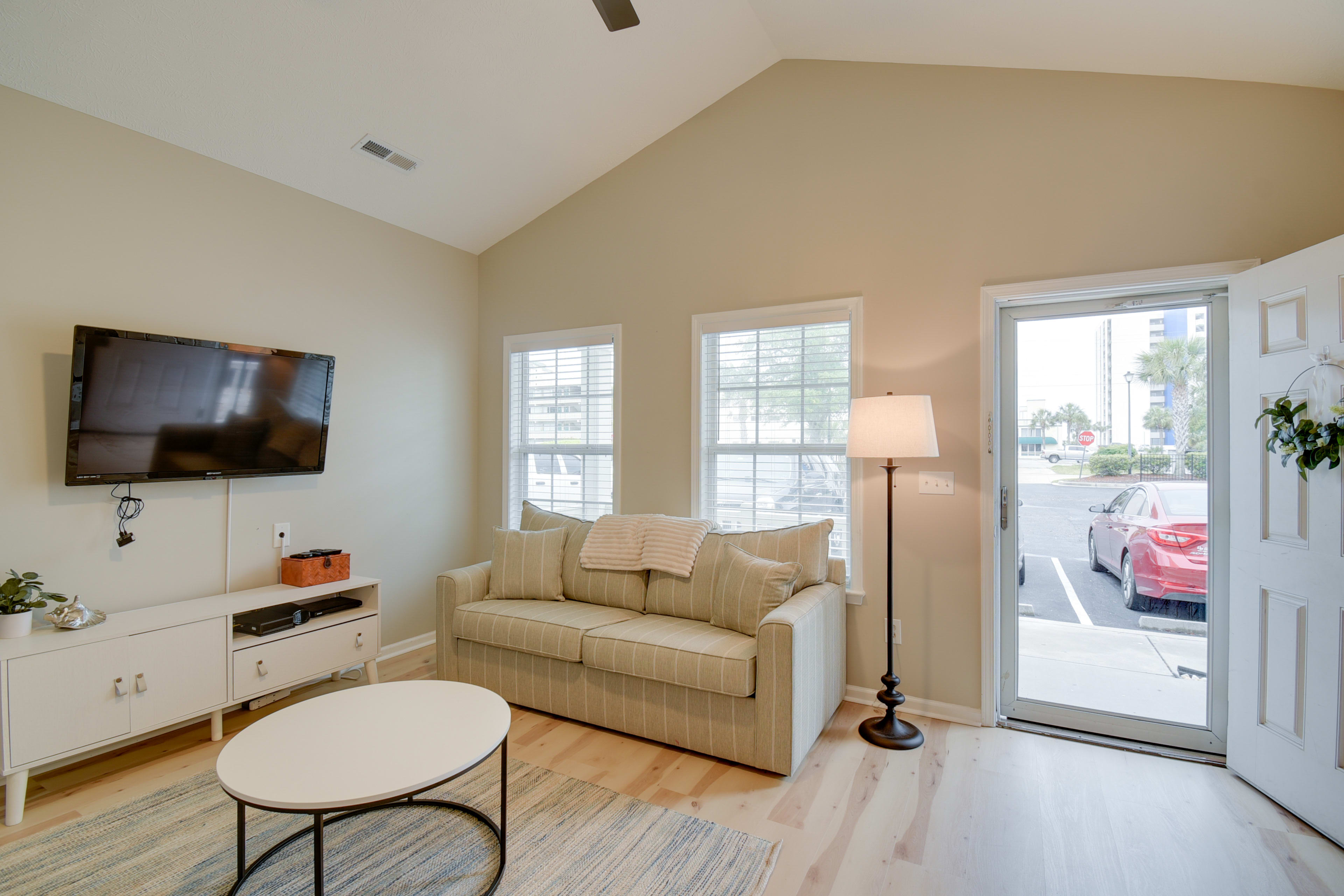 Living Room | Queen Sleeper Sofa | Breakfast Bar w/ Stools