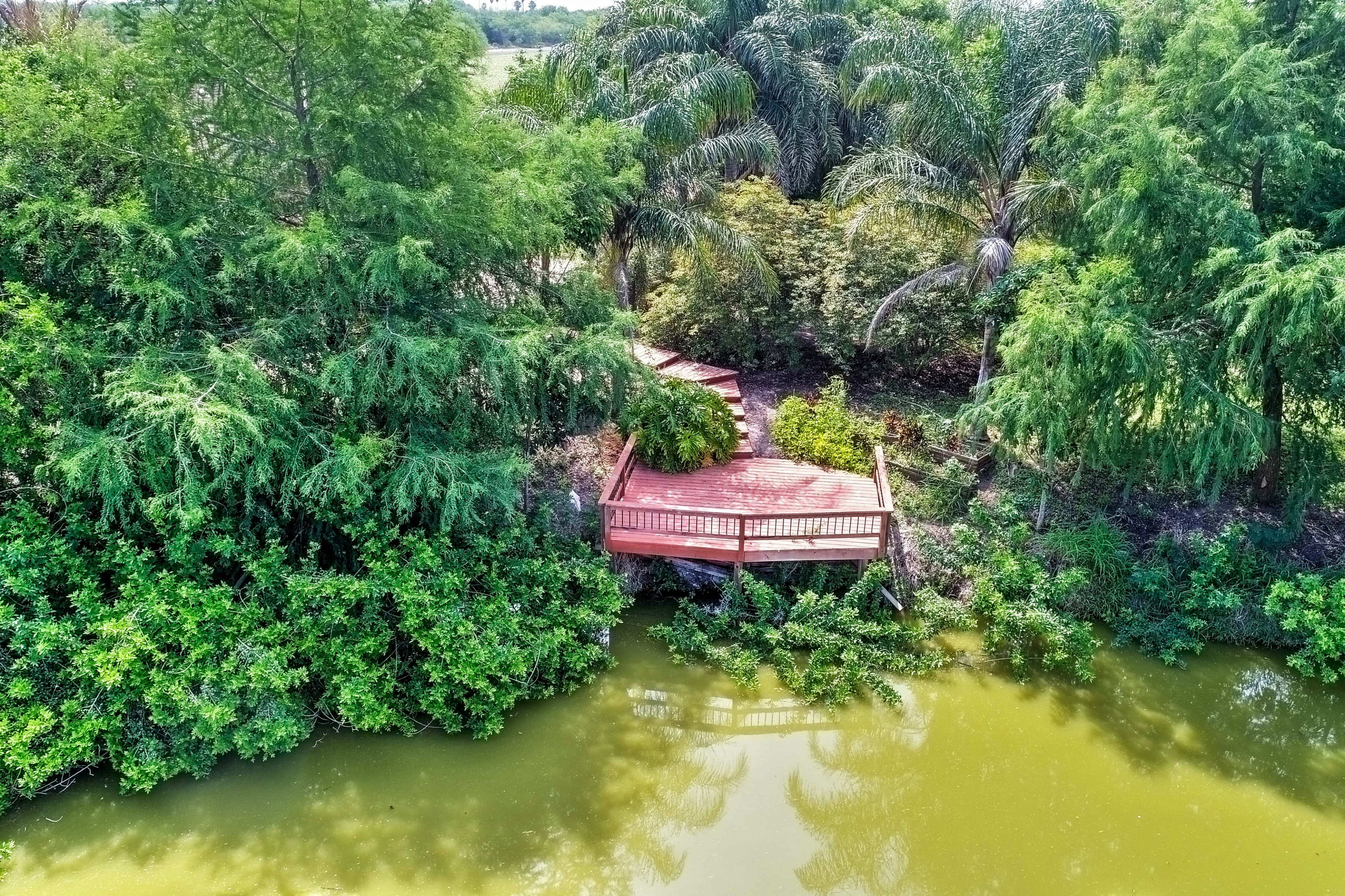 You'll love lounging on the private deck overlooking the neighboring pond.