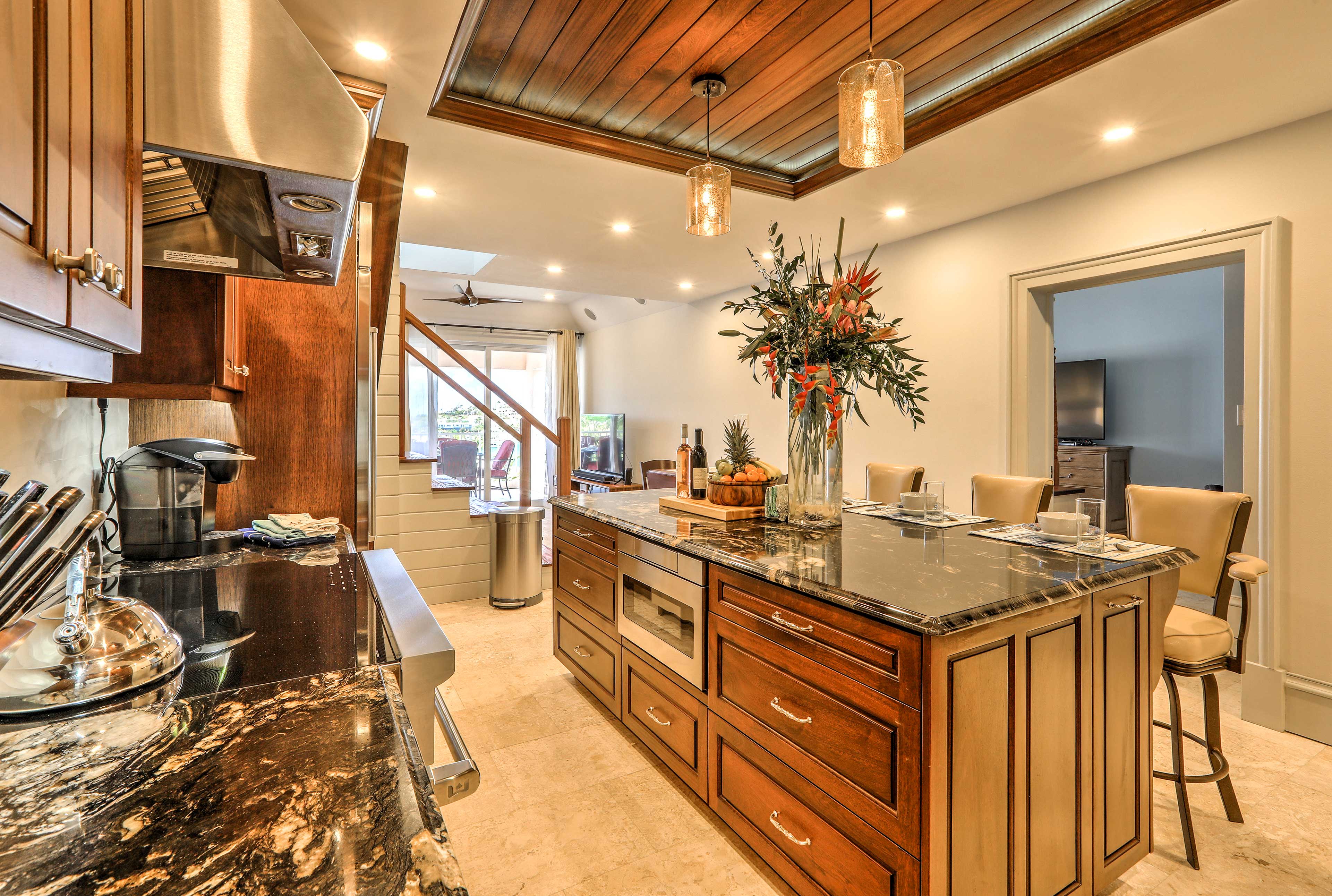 Stainless steel appliances make cooking in this kitchen easy as pie.